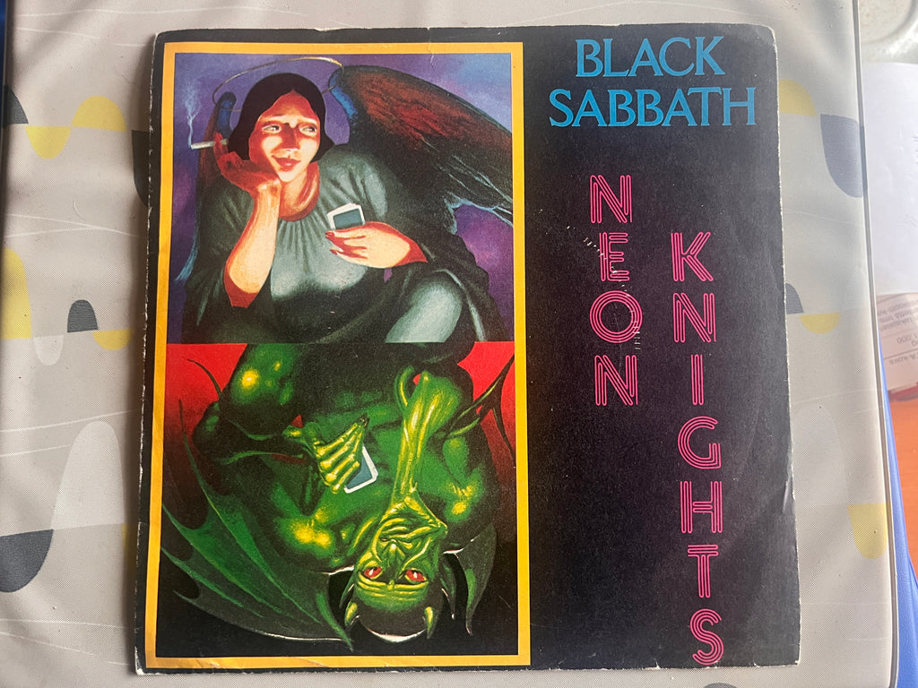 Black Sabbath: Neon Knights  7" single  b-side Children Of The Sea-live